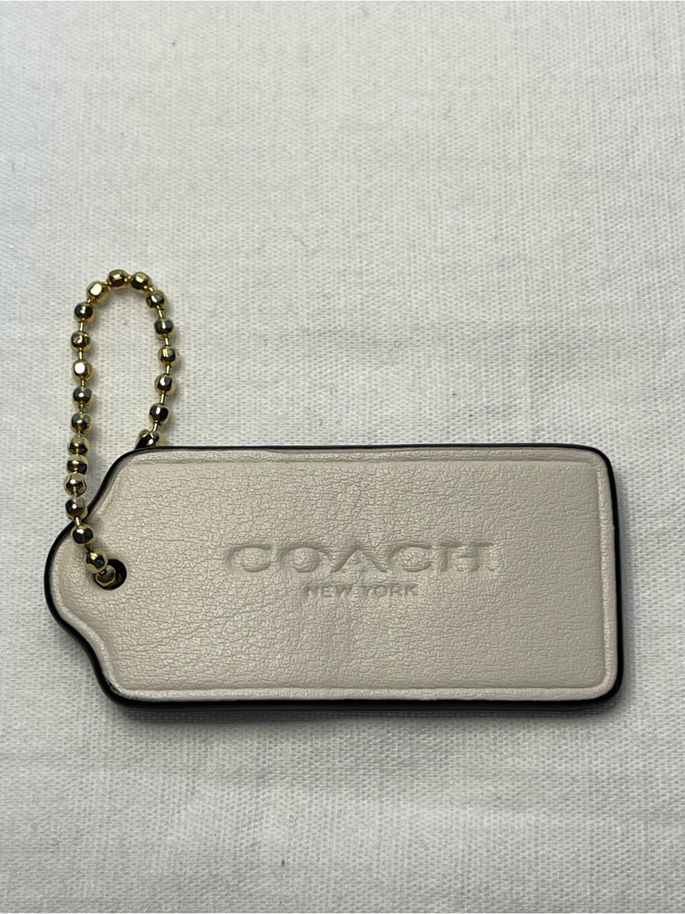 COACH Cream Leather Hang Tag with Gold Ball Chain